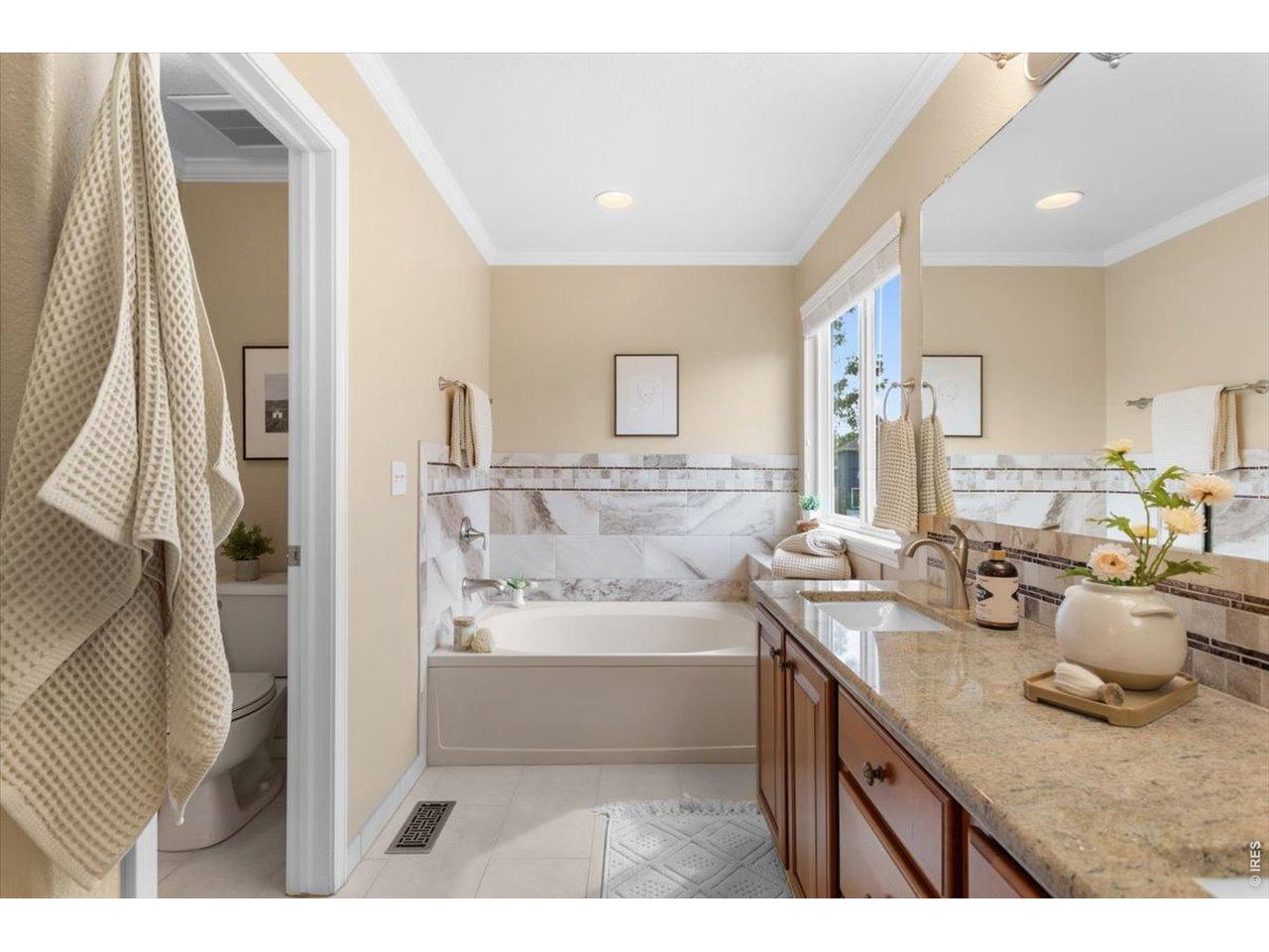 Property Photo 25 Bright 5-piece primary bathroom
