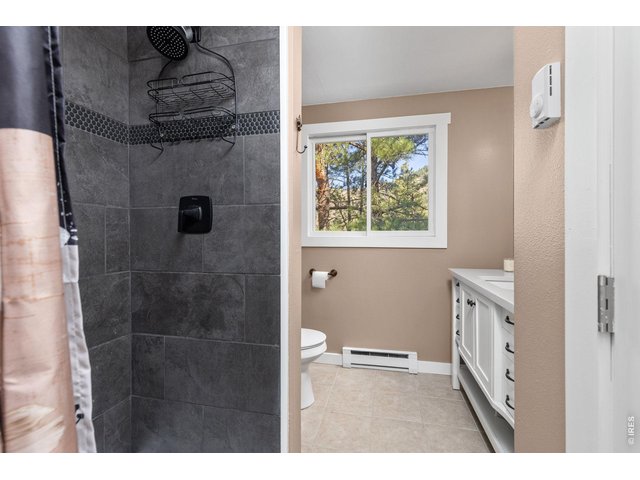 Property Photo 28 Upper-level 3/4 bath provides added convenience.