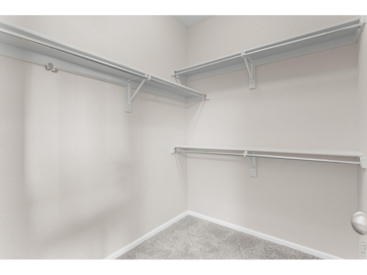 Property Photo 24 Primary Walk-In Closet
