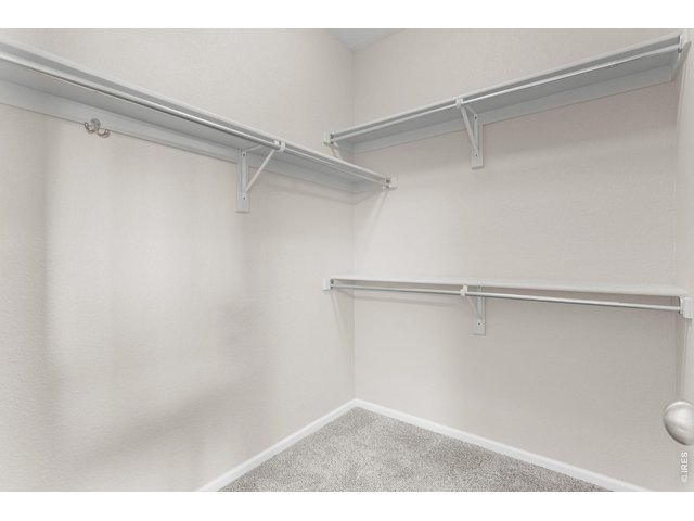 Property Photo 24 Primary Walk-In Closet