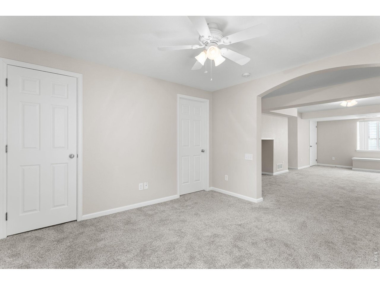 Property Photo 34 Basement Bedroom + Large Unfinished Storage Area Behind the Door
