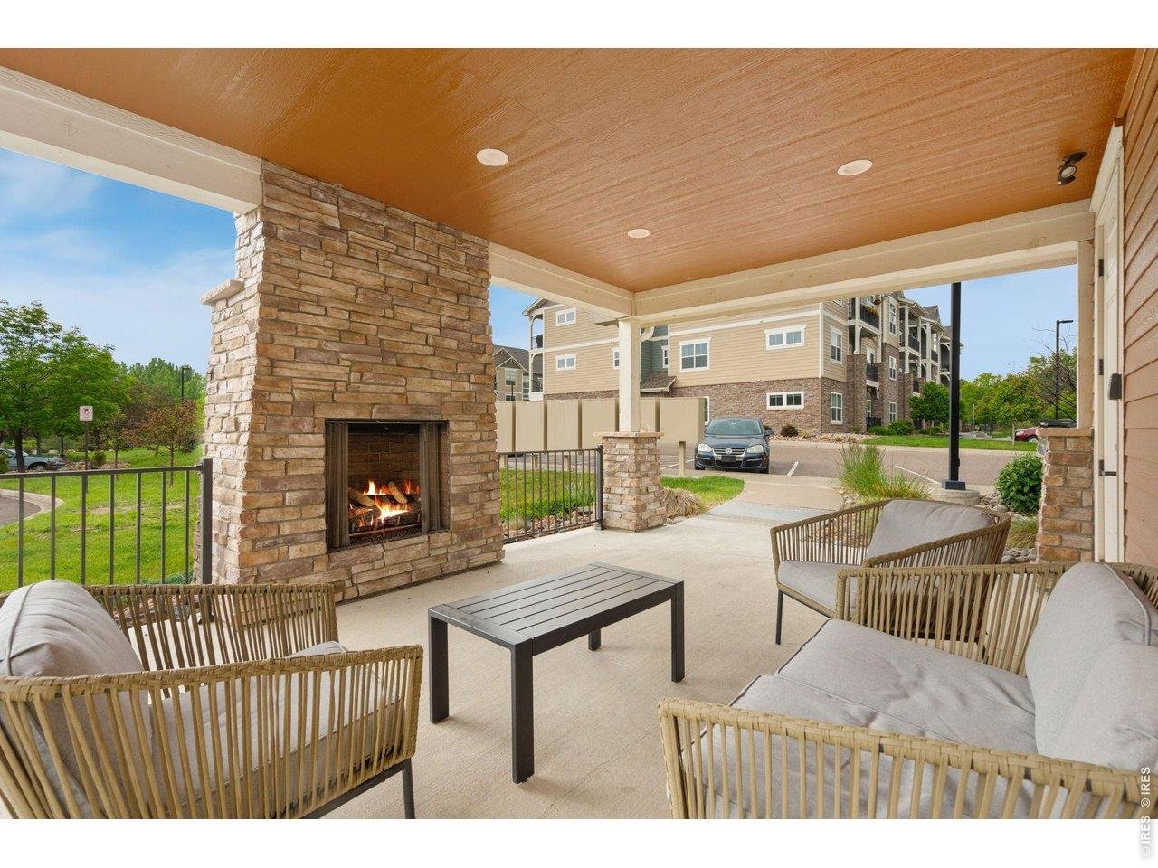 Property Photo 23 Outdoor living w/ fireplace at clubhouse