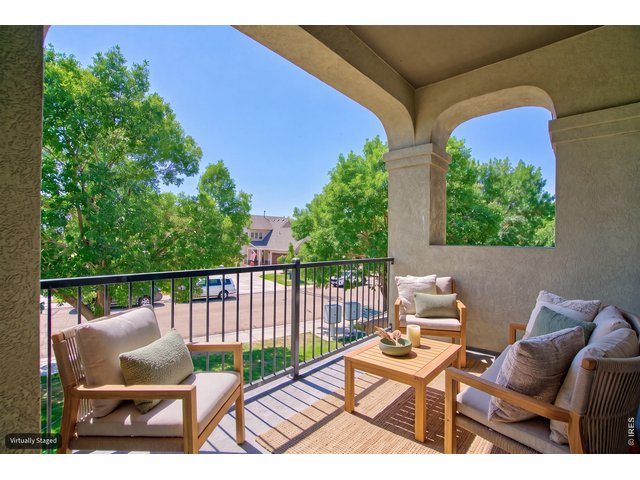 Property Photo 26 Covered balcony/patio faces southeast.