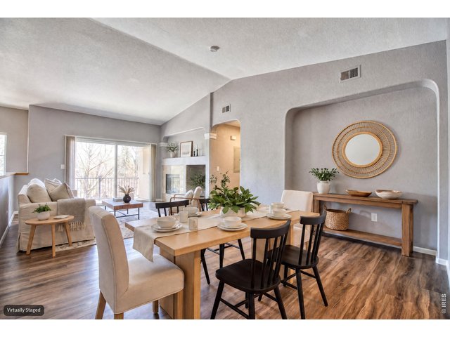 Property Photo 7 Dining room is conveniently located between kitchen & living room.