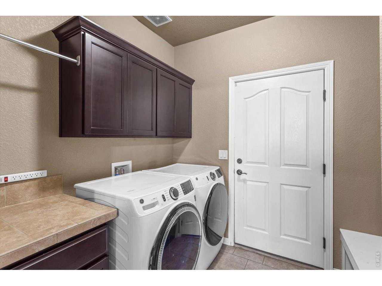 Property Photo 16 Large laundry off kitchen and garage