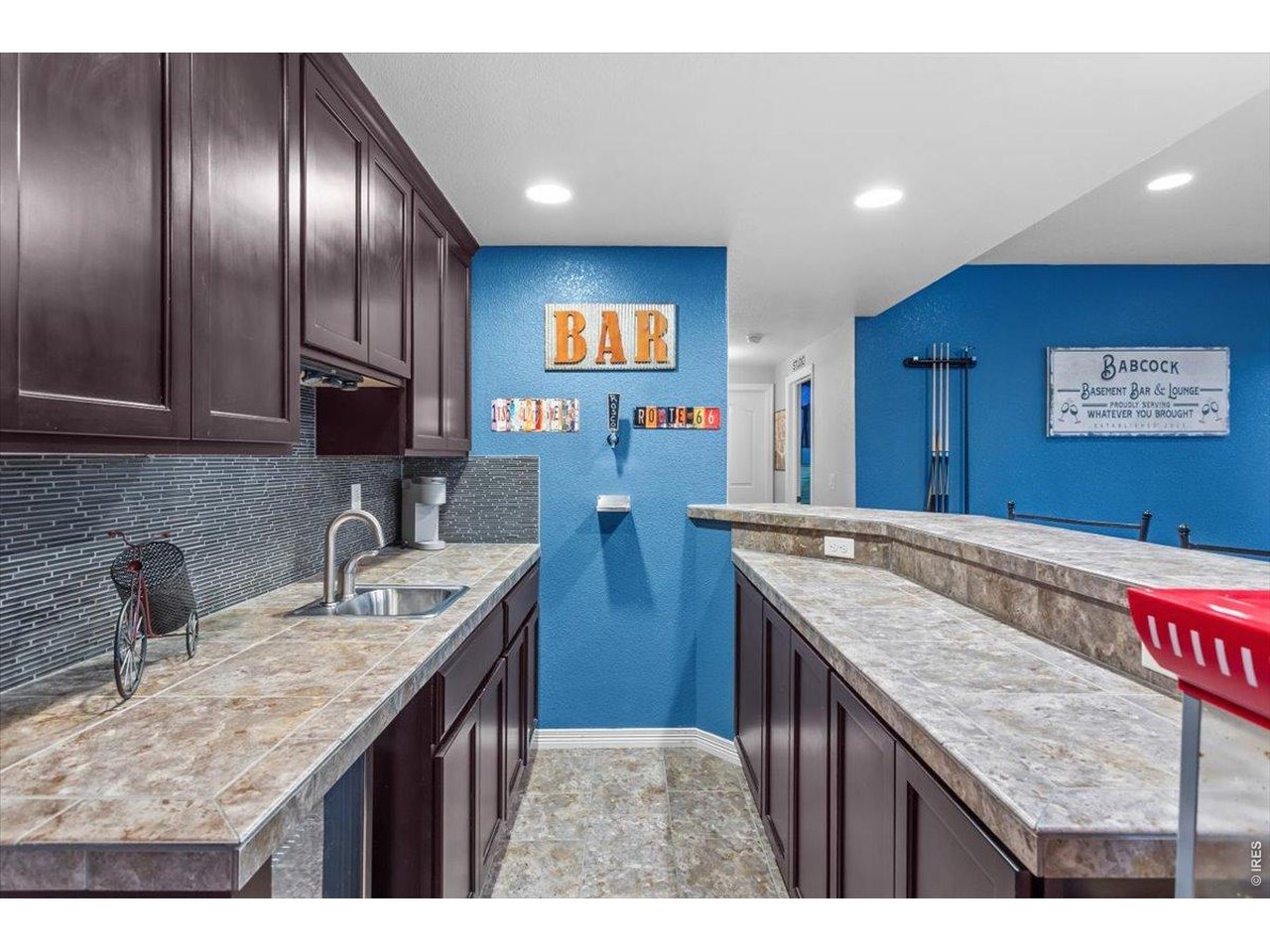 Property Photo 26 Wet bar in basement with kegerator