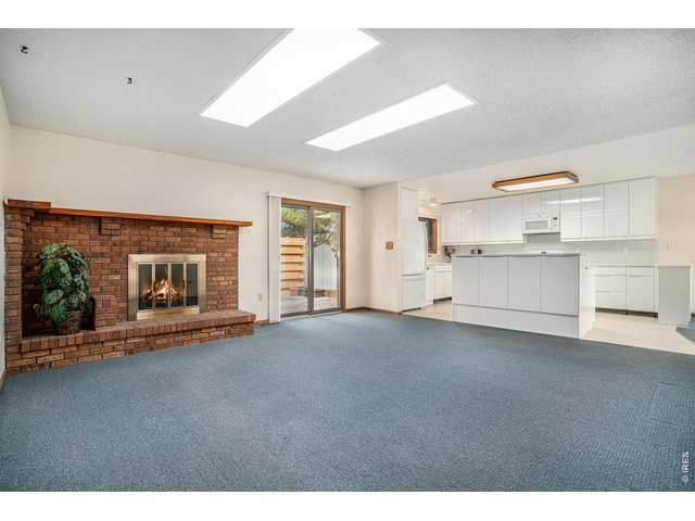Property Photo 11 Brick Fireplace