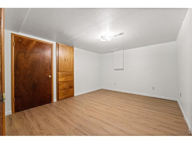 Property Photo 27 Bedroom #4 located in the basement