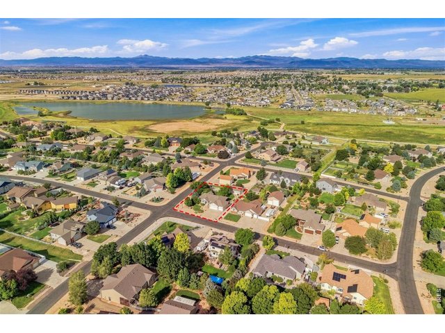 Property Photo 3 Aerial view of the property with Franklin Lake and mountain views to the west.