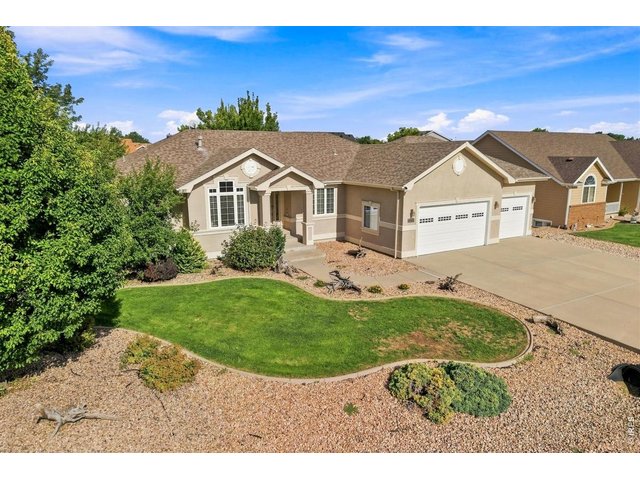 Property Photo 22 Oversized Attached 3-Car Garage with Room to Spare
