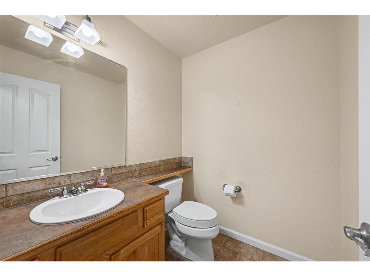 Property Photo 28 Convenient Main Level Half Bathroom