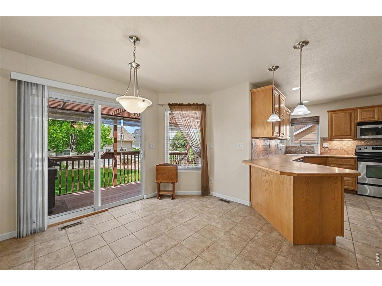 Property Photo 11 Bright Breakfast Nook with Peaceful Backyard Views