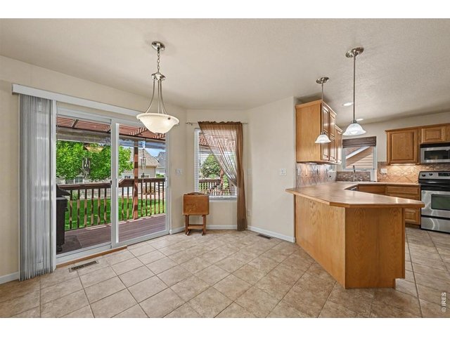 Property Photo 11 Bright Breakfast Nook with Peaceful Backyard Views