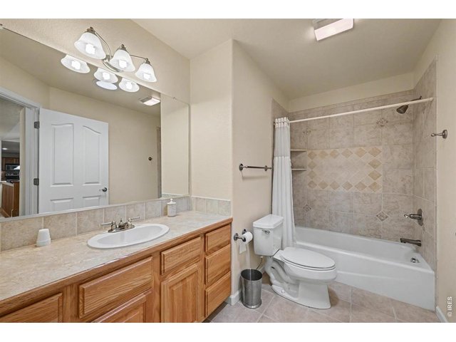 Property Photo 24 Bright Main-Level Full Bathroom with Skylight