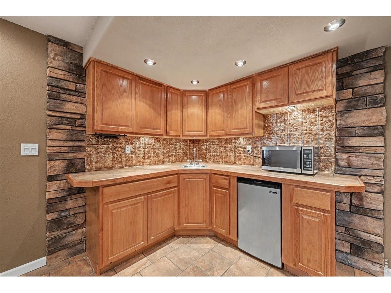 Property Photo 15 Entertainer s Wet Bar Featuring Custom Design Details