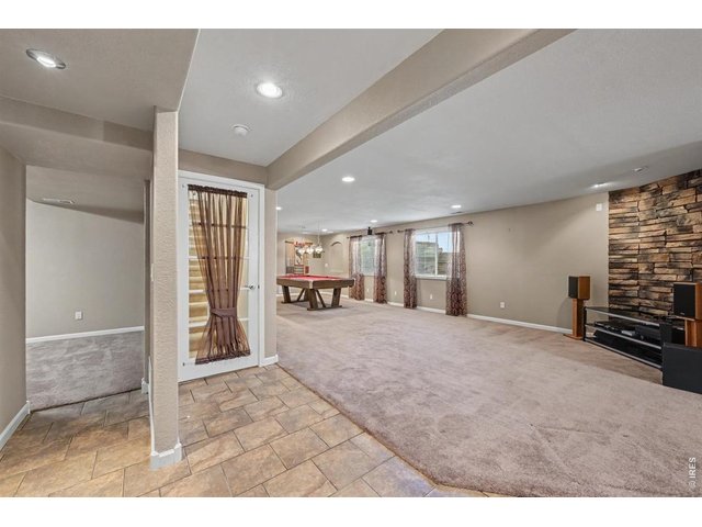 Property Photo 26 Open View from the Wet Bar to the Billiard and Flex Areas