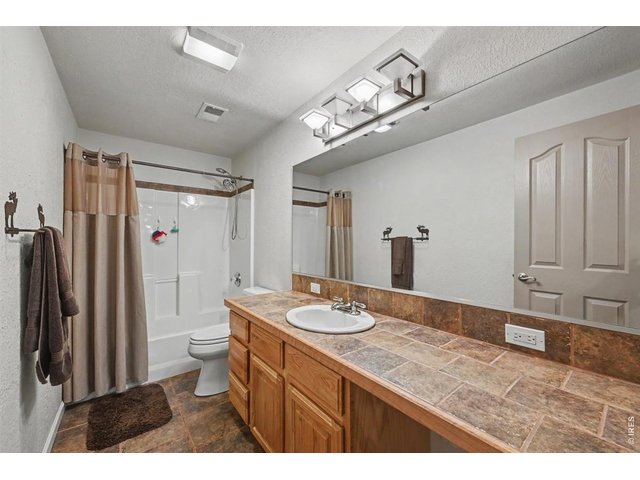 Property Photo 31 Comfortable Lower-Level Living with a Full Bathroom