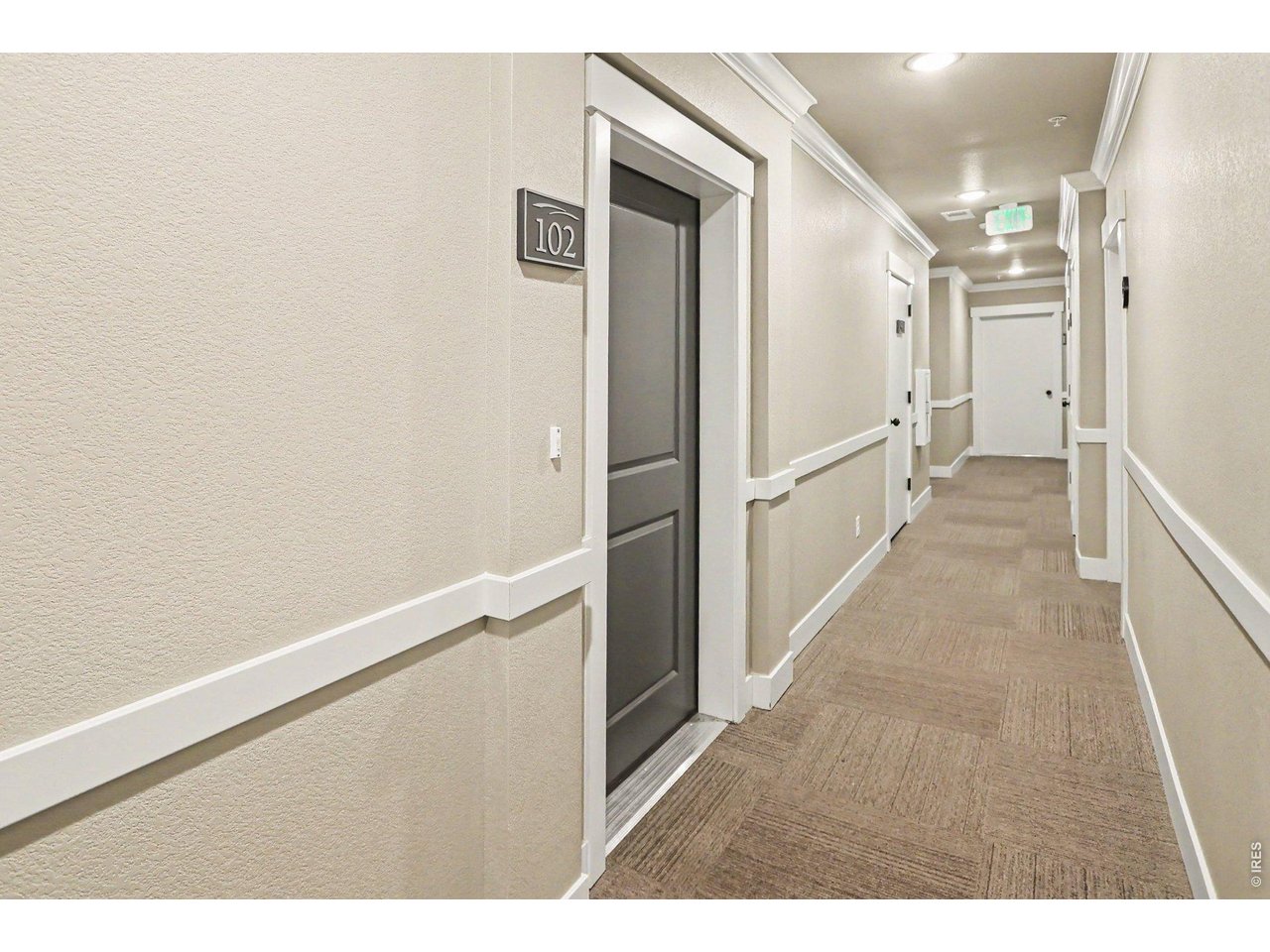 Property Photo 14 Hall leading to garage and common entry