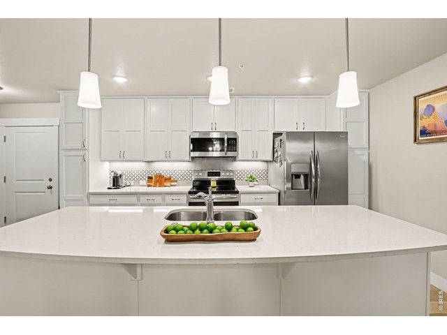 Property Photo 4 Huge island kitchen with quartz counters...