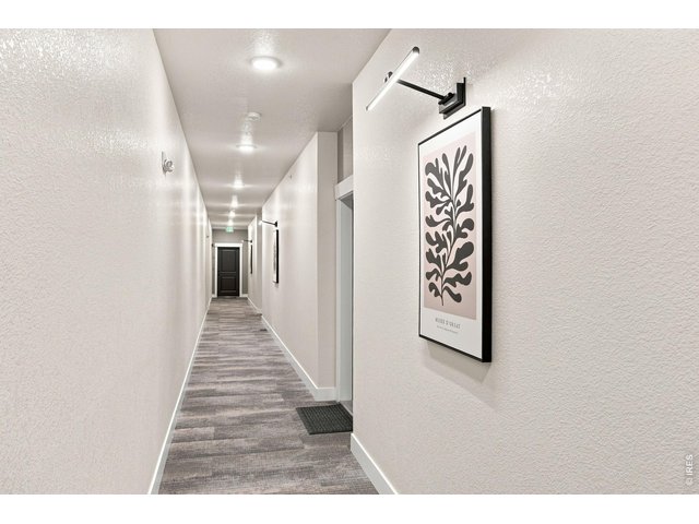 Property Photo 6 Secured Hallway to Unit