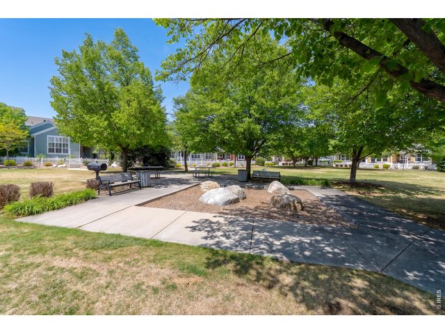 Property Photo 4 looking out to the community courtyard with picnic tables and a grill too!