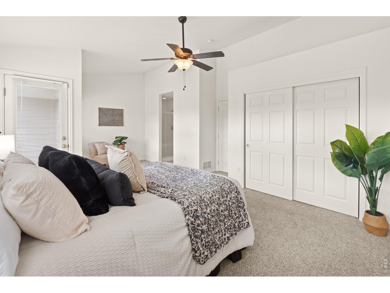 Property Photo 16 The first huge closet in this primary retreat and a door out to the private balcony