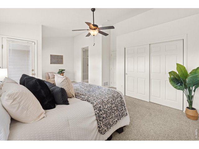 Property Photo 16 The first huge closet in this primary retreat and a door out to the private balcony