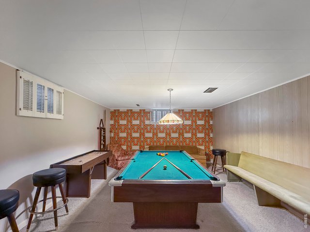 Property Photo 30 Recreation Room Comes with Pool Table Furniture and Air Hockey