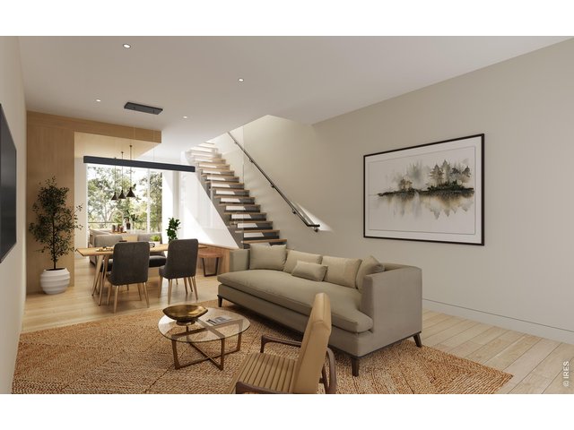 Property Photo 6 Open-Concept Main Living Level! (Picture is not of the actual build) Quartz Countertops, Shinnoki cabinetry, white oak floors! Stunning Modern design! Now at Drywall! Completed Jan. 2027 to Feb. 2027
