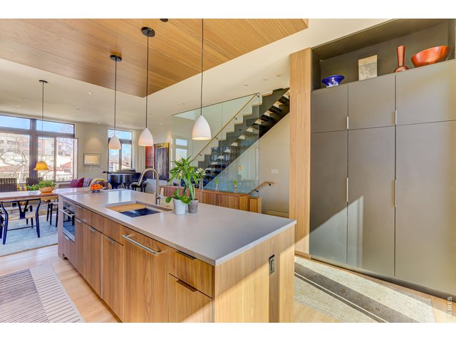 Property Photo 2 The kitchen Concept 10 foot high ceilings, floor to ceiling windows *Similar floor plan, finishes and feel at L'Avenir! (Picture is not of the actual build) Quartz Countertops, Shinnoki cabinetry.