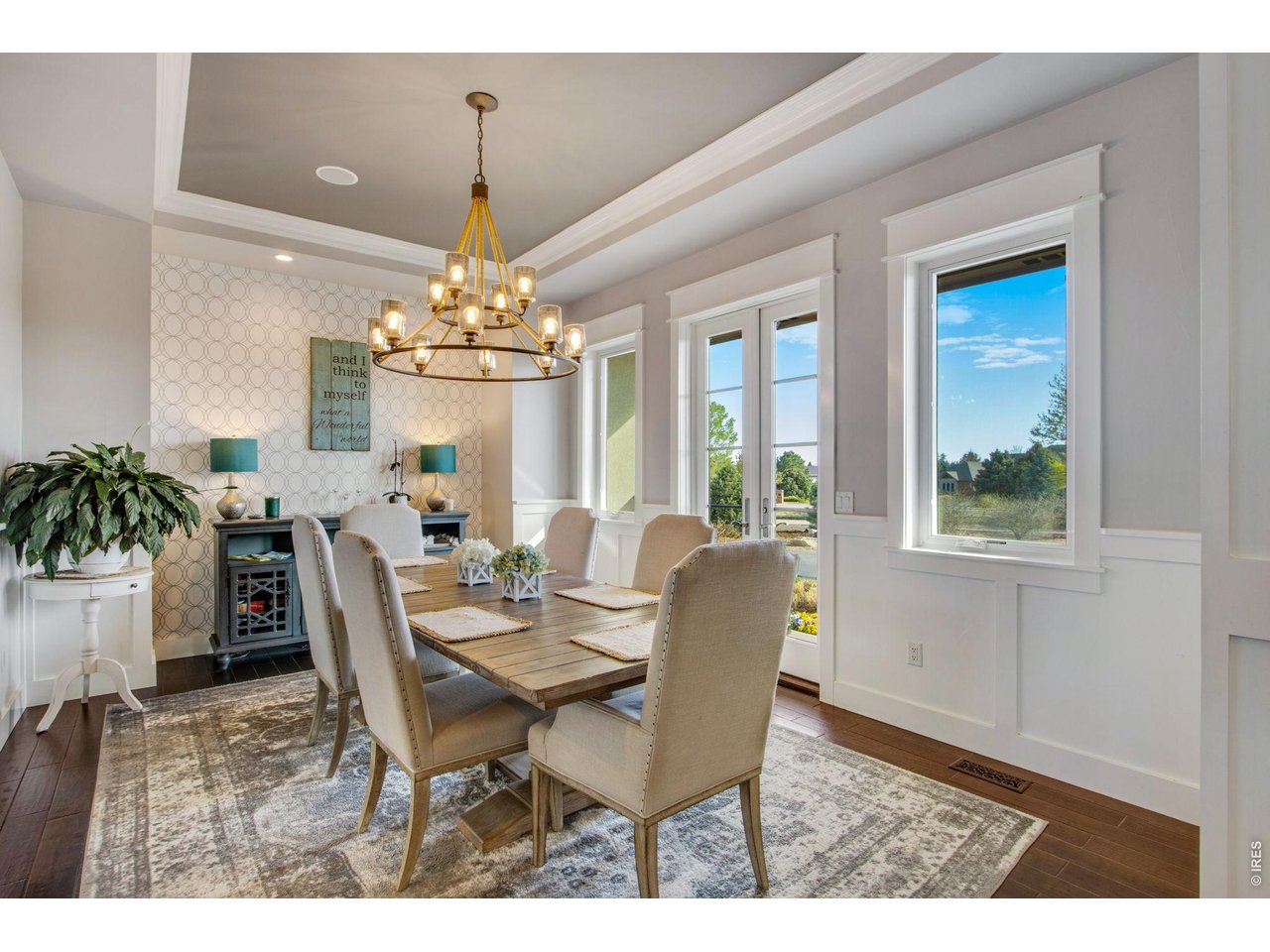 Property Photo 12 Formal Dining with floor to ceiling French doors to front porch.
