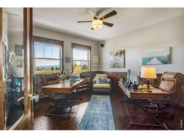 Property Photo 13 Custom wood wainscoting in the office with views of Longs Peak and the Rockies.