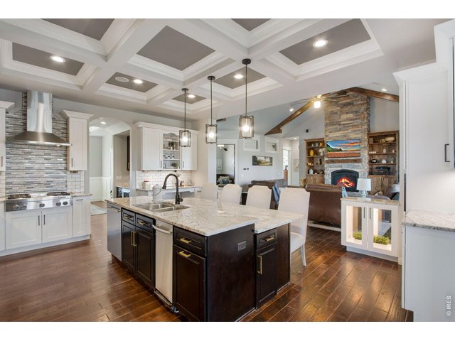 Property Photo 21 Trash Compactor, dishwasher and baking station all part of kitchen island amenities.