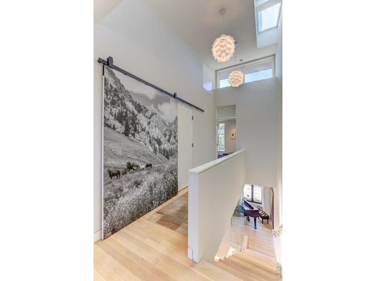 Property Photo 11 Sleeping Level Hallway, *Similar floor plan, finishes and feel at L'Avenir! (Picture is not of the actual build) hallway has white oak floors, convenient upper utility room, 9