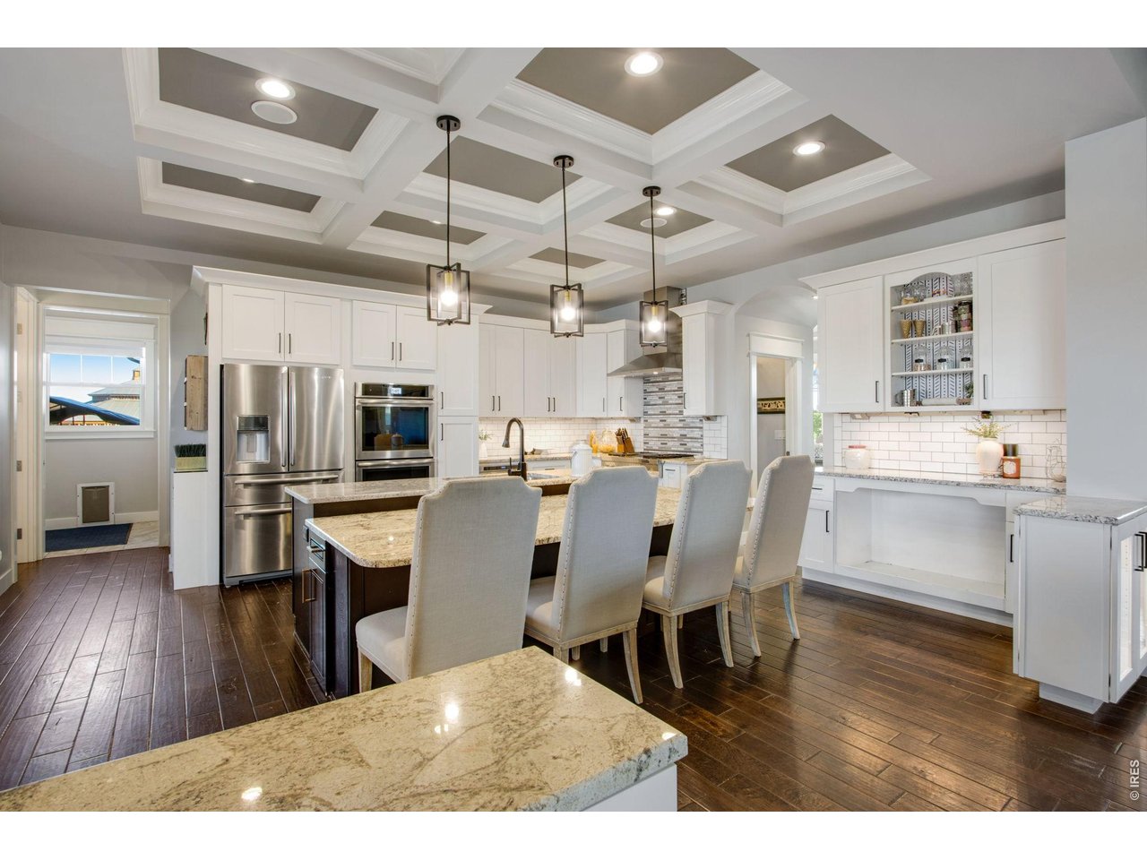 Property Photo 17 Kitchen island dining and a potential dog bed built right in.