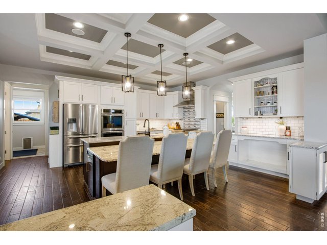Property Photo 17 Kitchen island dining and a potential dog bed built right in.