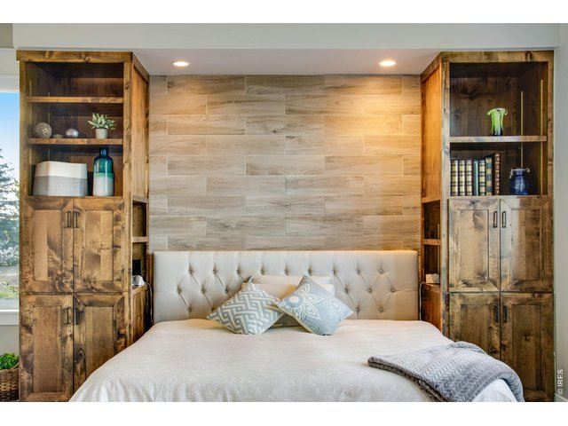 Property Photo 25 Custom built ins and illuminated accent headboard wall.