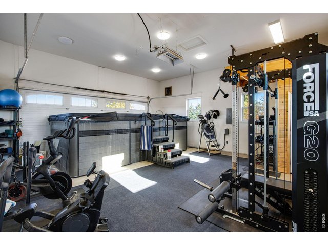 Property Photo 41 additional shop, studio gym garage training space with half bath.