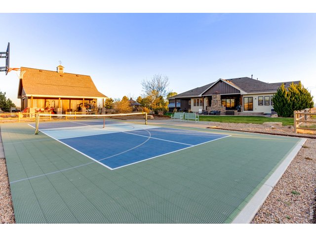 Property Photo 45 Courtside in the backyard. So much room for activities.