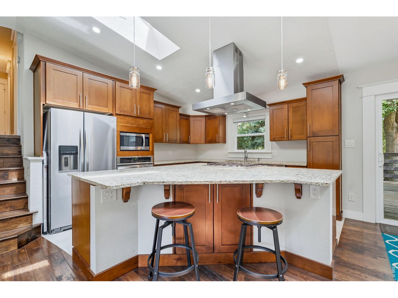 Property Photo 8 Open floorplan, fully updated kitchen and newer skylights