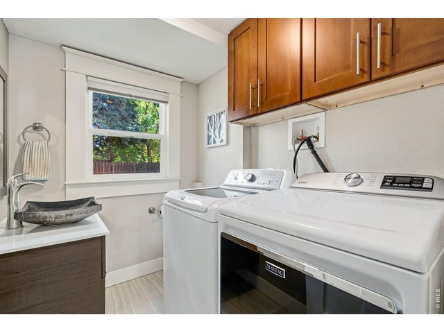 Property Photo 30 Half bath in shared laundry area.