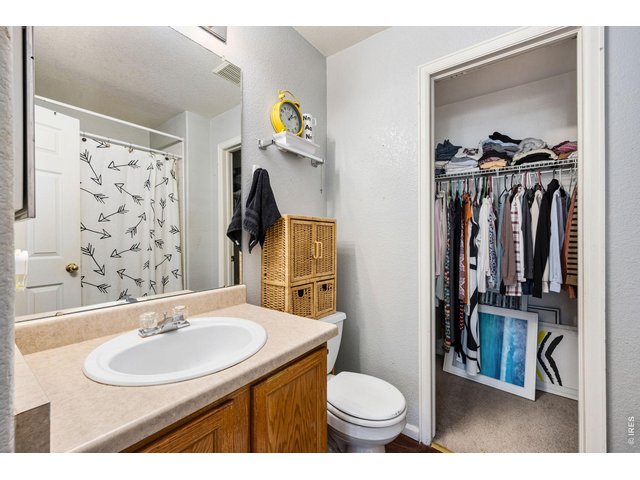 Property Photo 11 Primary Bath with Walk In Closet