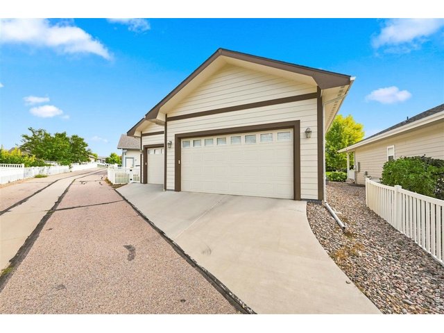 Property Photo 3 Oversized 3 Car Garage with alley access