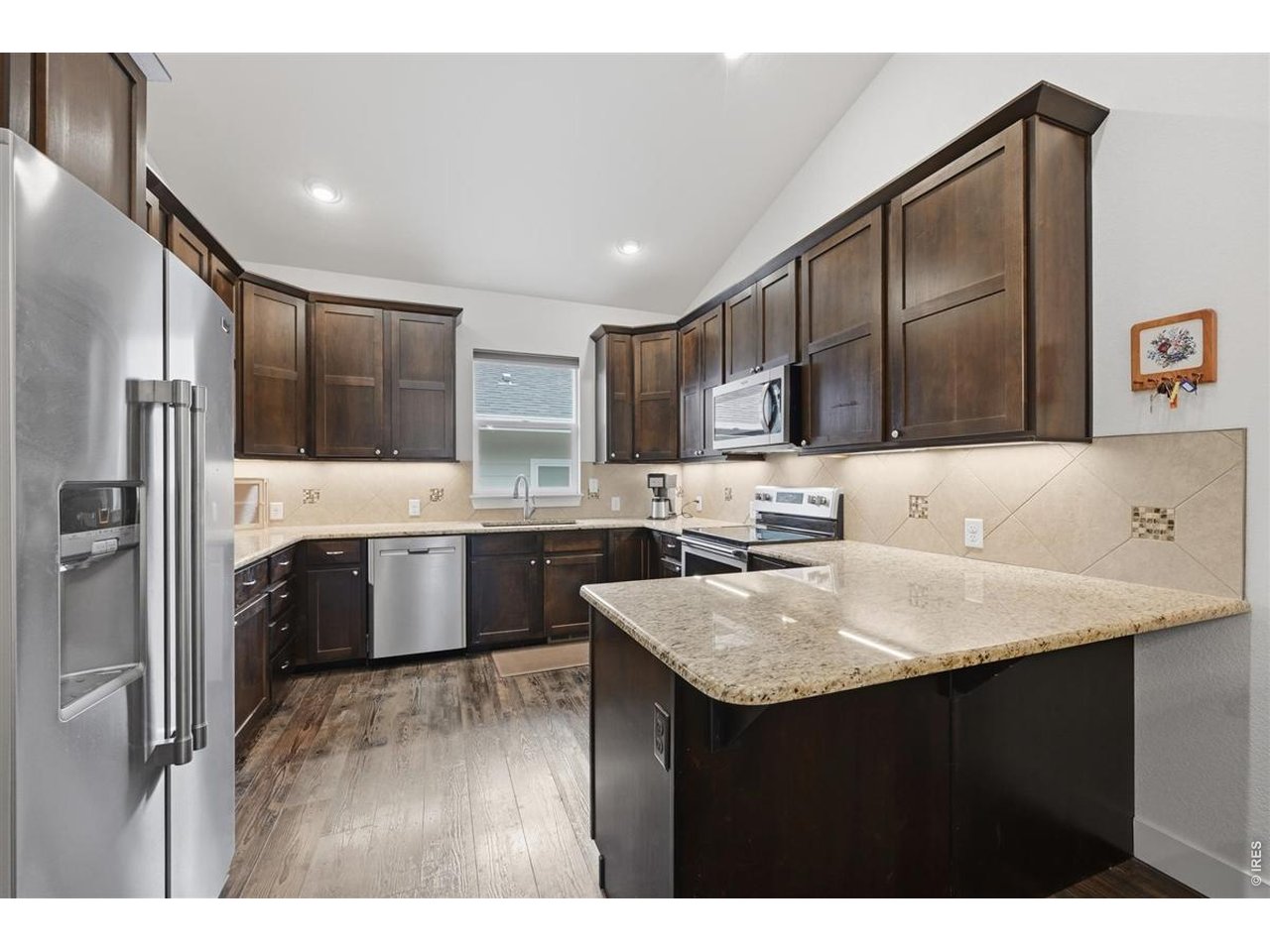 Property Photo 15 Kitchen with plenty of counter space and cabinets.