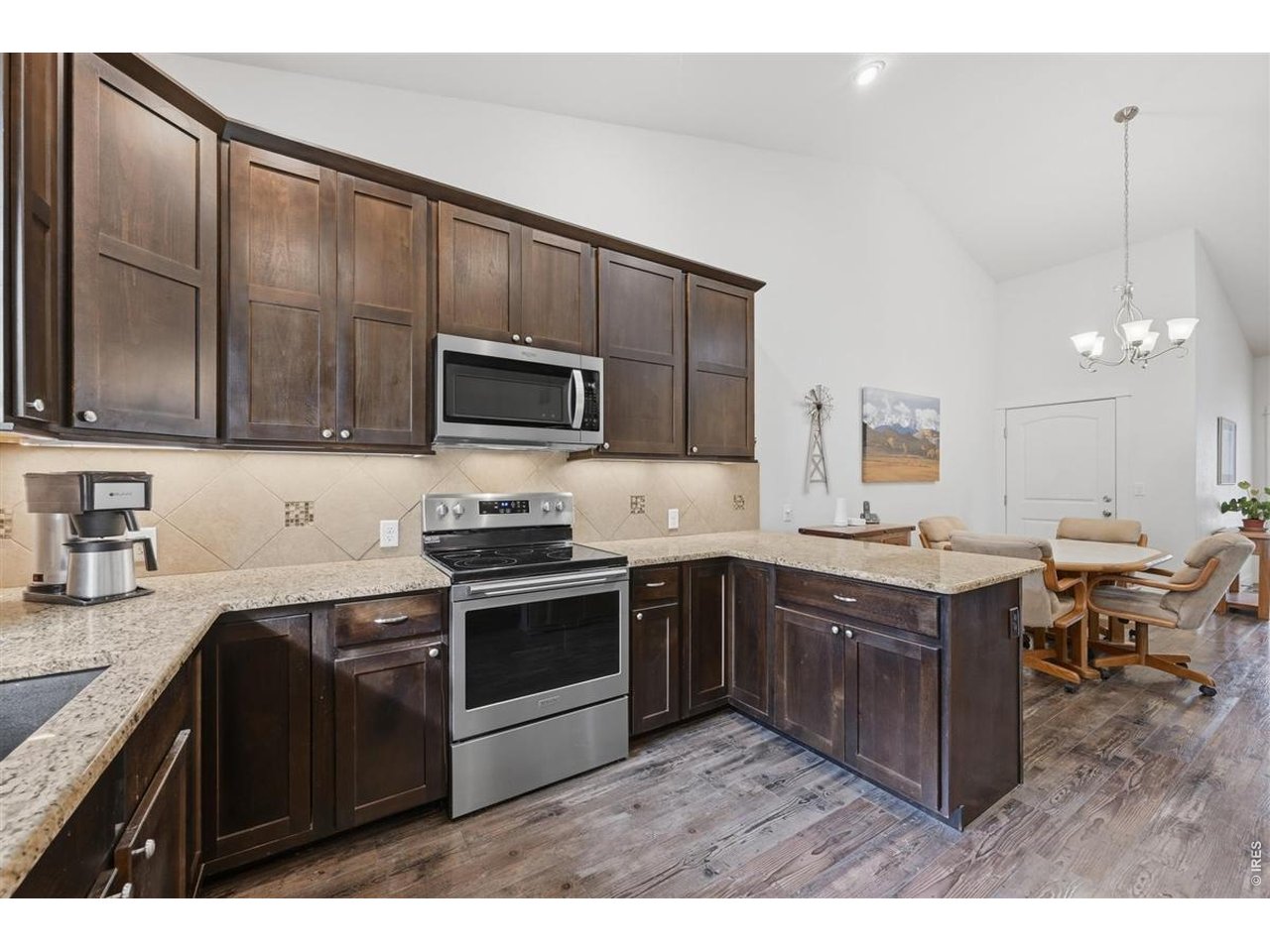 Property Photo 17 Kitchen and stainless steel appliances
