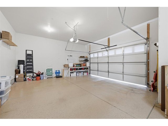 Property Photo 18 Oversized 3 car garage with epoxy flooring