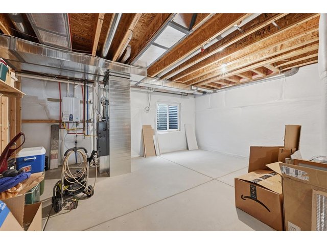 Property Photo 20 Full unfinished Basement with tankless water heater