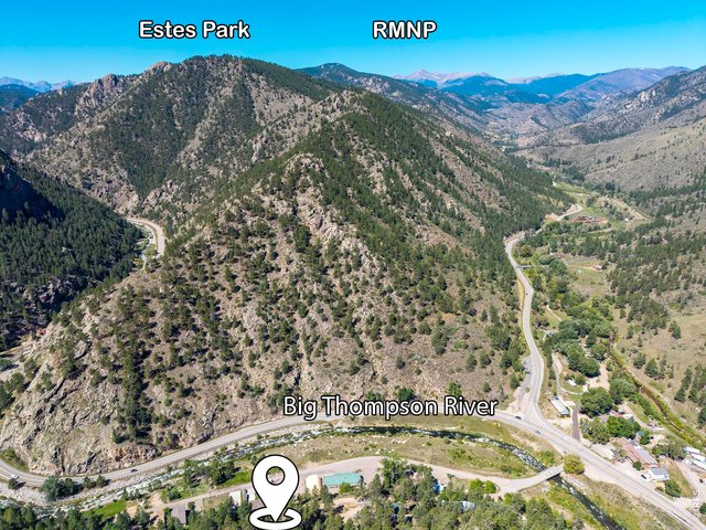 Property Photo 39 Highway 34 continues west toward Estes Park, just 13 miles away, with Rocky Mountain National Park beyond.