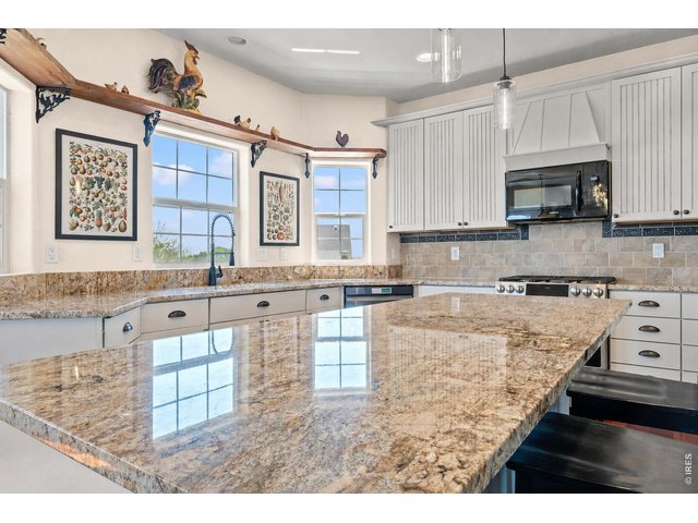 Property Photo 15 Virtually painted. BRILLIANT Granite Countertops!