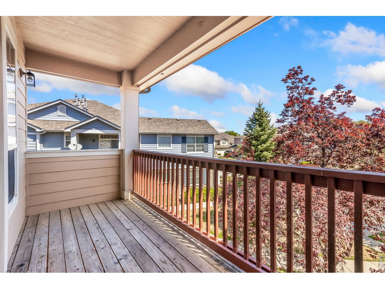 Property Photo 30 Private balcony with mature landscaping